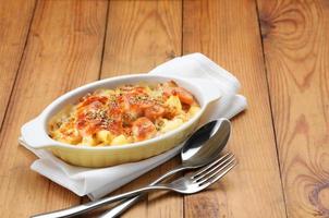 Baked Macaroni and Cheese with sausage. photo