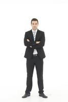 hombre de negocios guapo e inteligente en traje negro aislado sobre fondo blanco. concepto de negocios y finanzas. copie el espacio foto