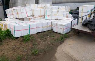 The styrofoam boxes for shipping are stacking near the platform. photo