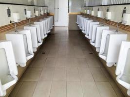 White urinals row photo