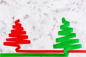 Christmas tree made of ribbon on white background. photo
