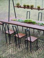 Modern wooden table and chair set. photo