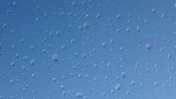 Time lapse of rain drops on a windows video