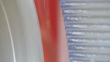 Close up view on a sharp rotating steel cutting blade of a cutting machine video