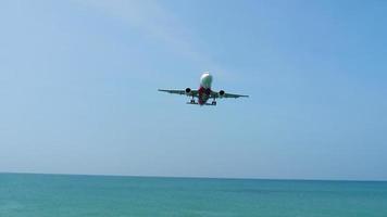 Airplane approaching over ocean video