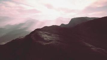 barren mountains in afghanistan in dust video