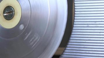 Close up view on a sharp rotating steel cutting blade of a cutting machine video