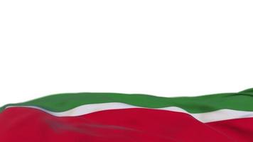 Tatarstan fabric flag waving on the wind loop. Tatarstan embroidery stiched cloth banner swaying on the breeze. Half-filled white background. Place for text. 20 seconds loop. 4k video