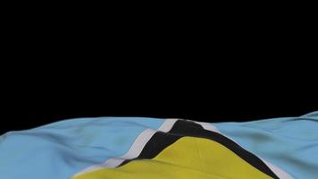 St. Lucia-Stofffahne weht auf der Windschleife. Saint-Lucia-Stickerei genähtes Stoffbanner, das sich im Wind wiegt. halb gefüllter schwarzer Hintergrund. Platz für Texte. 20 Sekunden Schleife. 4k video