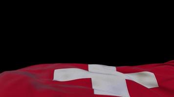 drapeau en tissu suisse agitant sur la boucle du vent. bannière en tissu cousu de broderie suisse se balançant sur la brise. fond noir à moitié rempli. place pour le texte. Boucle de 20 secondes. 4k video