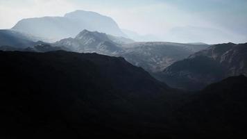 barren mountains in afghanistan in dust video