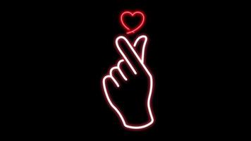 Animation mini hearts neon light shape isolate for Valentine's day on black background. video