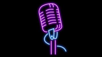 Animation purple microphone neon light shape isolate on black background. video