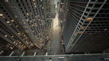 Aerial hyperlapse of busy car traffic in between Skyscrapers of modern urban metropolis city center video