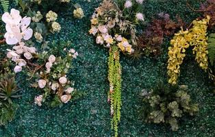 Artificial flower of the plant wall. photo