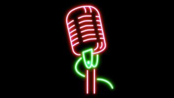 Animation red microphone neon light shape isolate on black background. video