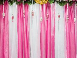 Pink and white fabric backdrop. photo