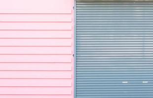 Roller shutter on the pink wall photo