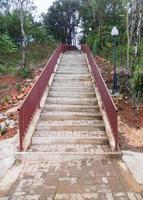 New concrete staircase with the brick ground photo