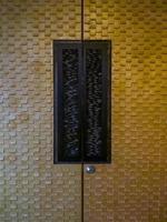 The luxury door with the warm light for decoration of the seminar room. photo