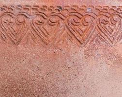 Flora pattern on the old pottery surface. photo