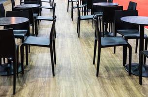 Group of the modern black chair and table set for customer. photo