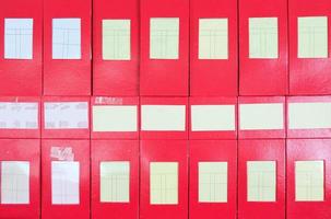 Red cardboard box pile with label to contain the document. photo