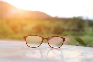 Black Eye Glasses on green grass photo