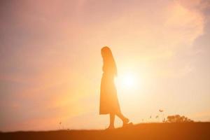 Sad and depressed woman alone photo