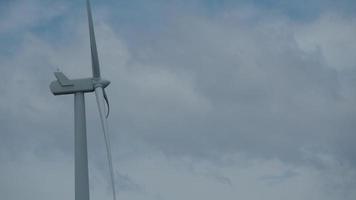 A large electric windmill against the backdrop of the sky. video