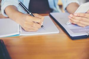 Hand writing in notebook for background photo