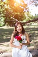 Flowers in woman hand photo