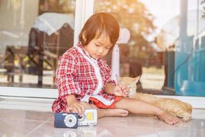 little girl photographs flower outdoor photo