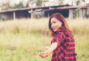 Beautiful woman pointing to the camera photo