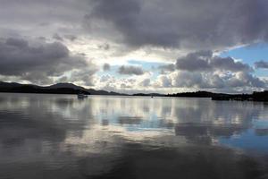 A view of Loch Lomond in Scotland in the morning sunshine photo