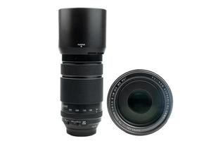 Khonkaen,THAILAND  19 May 2022 Fujinon lens XF 70-300 MM for Fujifilm X-mount mirrorless cameras, black telephoto lens for shooting distant objects, on white background white clipping path photo