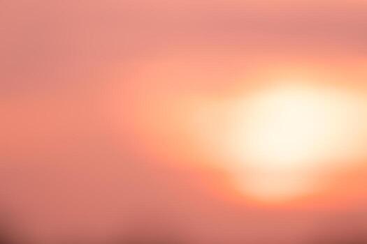 orange smooth gradient blurred background has a little abstract light. soft background for wallpaper,design,graphic and presentation photo