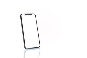 Black realistic smart phone mockup isolated in white background. photo