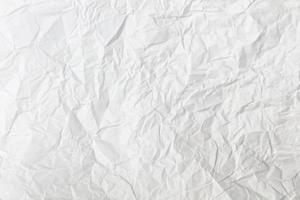 fondo de textura de papel arrugado blanco abstracto. hoja de papel arrugado blanco. foto