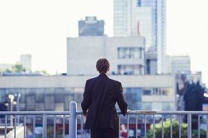 Businessman watching city view. photo