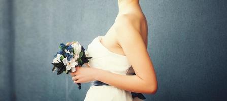 model with a bouquet of flowers photo