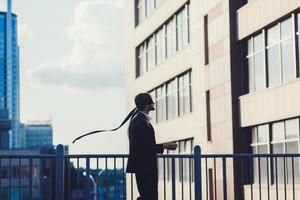 Businessman walk on roof photo