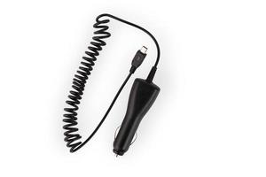 Black car charger with USB output cable for charging old-style phones on a white background. photo