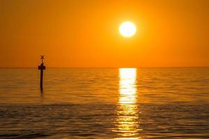 Beautiful sunset over the sea at Frankston beach a small suburb town in Melbourne, Australia. photo