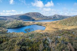 The scenery view of Lake Lila and Dove Lake view from the top of Wombat peak in Cradle mountain of Tasmania state Australia. photo