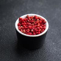 peppercorn pink pepper allspice peppercorns spices meal food diet on the table copy space food background photo