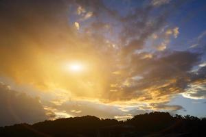 Beautiful orange sky and mountain sunset background. Colorful sky background. photo