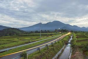 concrete rebate roads and water garages in rice fields that make it easier for farmers to do all their work photo