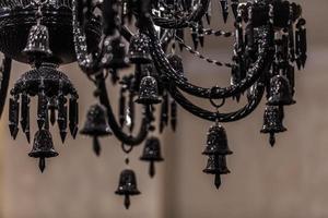 details of a modern black chandelier photo