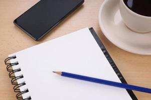 blank writing pad on desk photo